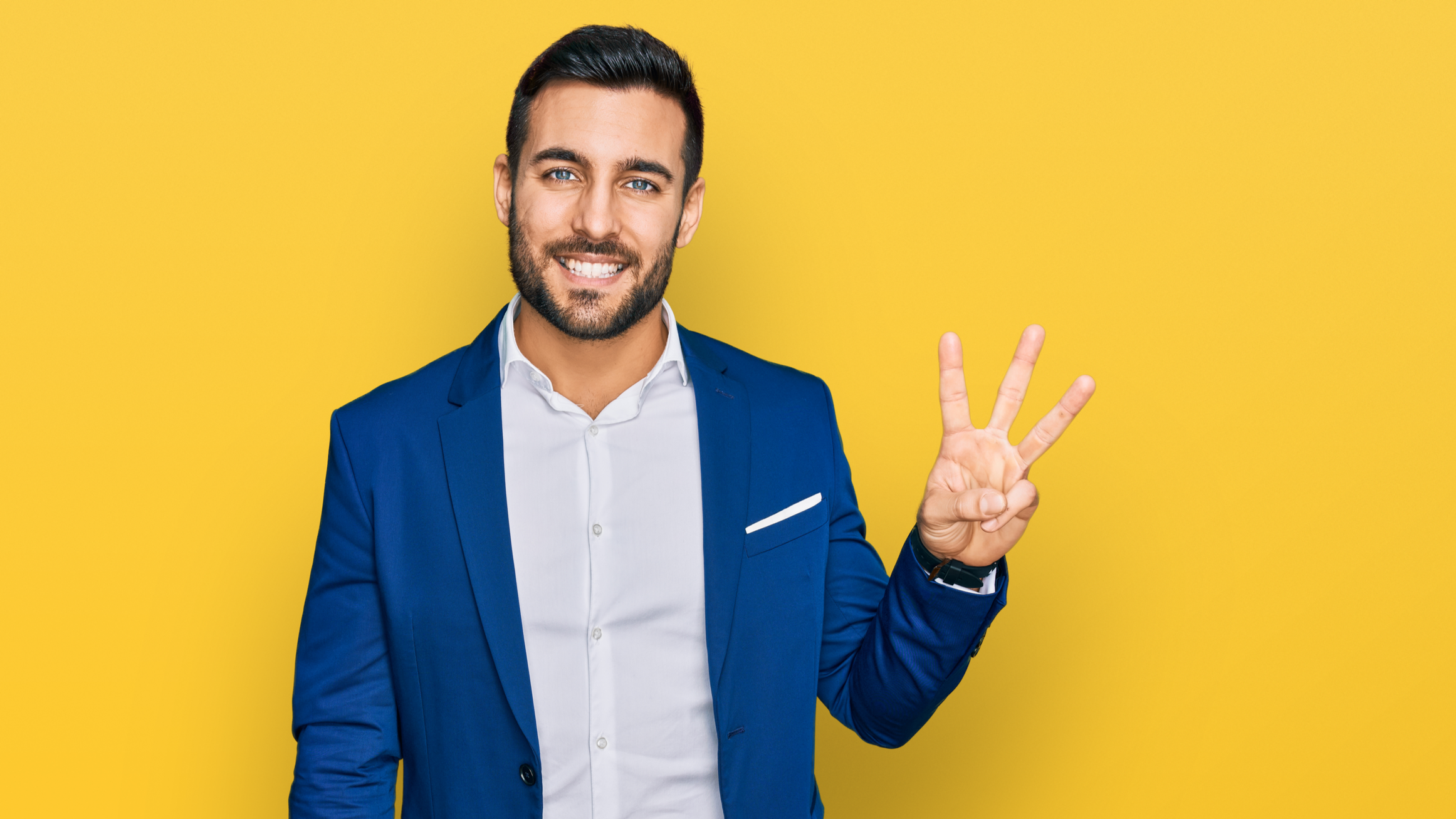 Business person holding up 3 fingers. Concept of 3.